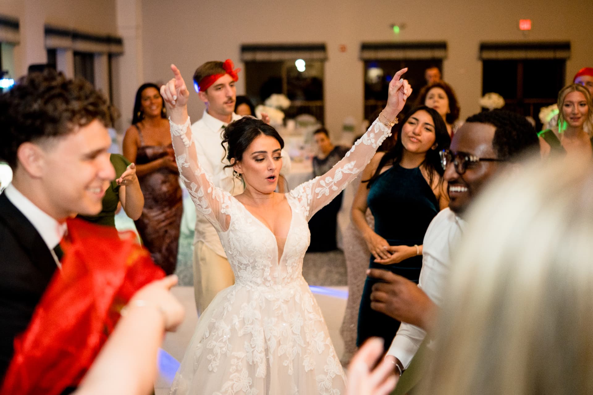Bride dancing with guests at the reception